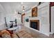 Well-lit sunroom featuring a fireplace and plenty of space at 361 5Th Nw St, Hickory, NC 28601