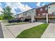 Row of modern townhomes featuring garages and wooden decks at 4060 Zilker Park Dr, Charlotte, NC 28217