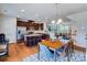 Open concept kitchen and dining area is perfect for entertaining at 4060 Zilker Park Dr, Charlotte, NC 28217