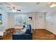 Inviting living room featuring hardwood floors, bright windows, and stylish furnishings at 4060 Zilker Park Dr, Charlotte, NC 28217