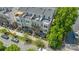 Townhomes featuring rooftop terraces and manicured landscaping enhance the neighborhood's appeal at 420 E 16Th St, Charlotte, NC 28206