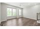 Bedroom with hardwood floors, recessed lighting, and natural light from two large windows at 420 E 16Th St, Charlotte, NC 28206