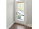 Elegant entry door with glass panel offering a glimpse of the neighborhood at 420 E 16Th St, Charlotte, NC 28206