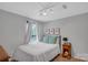 Cozy bedroom with natural light, a comfortable bed, and simple decor at 4407 Beauvista Dr, Charlotte, NC 28269