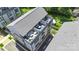 Stunning aerial view of the modern townhome showcasing its multi-level rooftop terraces and lush surroundings at 4520 Radler Ct, Charlotte, NC 28217