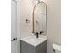Elegant bathroom featuring modern fixtures, a stylish mirror, and a clean aesthetic at 4520 Radler Ct, Charlotte, NC 28217