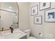 Modern bathroom featuring a streamlined vanity, sleek fixtures, and stylish decor at 4520 Radler Ct, Charlotte, NC 28217