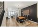 Dining area with modern chandelier and open to the gourmet kitchen at 4520 Radler Ct, Charlotte, NC 28217