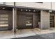 Modern townhome exterior with a sleek garage door, contemporary design, and the unit number clearly displayed at 4520 Radler Ct, Charlotte, NC 28217