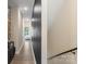 Hallway with modern design, featuring sleek black accents and hardwood flooring at 4520 Radler Ct, Charlotte, NC 28217
