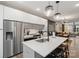 Modern kitchen features stainless steel appliances, a large island, and stylish lighting at 4520 Radler Ct, Charlotte, NC 28217