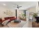 Bright and airy living room with modern furnishings and a cozy feel at 4520 Radler Ct, Charlotte, NC 28217