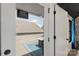 View through a patio door to an outdoor deck area, complete with seating and table, perfect for relaxation at 4520 Radler Ct, Charlotte, NC 28217