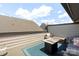 Inviting rooftop deck with comfortable seating, gas fire table, and outdoor decor, ideal for entertaining guests at 4520 Radler Ct, Charlotte, NC 28217