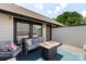 Stylish rooftop deck featuring a cozy gray sofa, accent pillows, and modern outdoor furniture for relaxing and entertaining at 4520 Radler Ct, Charlotte, NC 28217