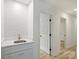Tastefully renovated bathroom with modern sink, cabinetry, and stylish tile accents at 4633 Cringle Ct, Charlotte, NC 28226