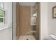 Elegant bathroom with a glass-enclosed shower, marble countertop, and modern gold fixtures at 4633 Cringle Ct, Charlotte, NC 28226