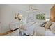 Light, bright bedroom with white walls, hard wood floors, and a decorative mirror above the dresser at 4633 Cringle Ct, Charlotte, NC 28226