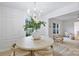 Elegant dining area bathed in natural light with views of the outdoor scenery at 4633 Cringle Ct, Charlotte, NC 28226