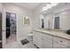 Bright bathroom features a vanity with granite countertop and two walk-in closets at 5118 Waldron Meadow Dr, Charlotte, NC 28226