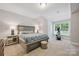 Inviting bedroom boasts a plush bed and a large window for plenty of natural light at 5118 Waldron Meadow Dr, Charlotte, NC 28226