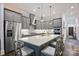 Beautiful open kitchen featuring a large island, stainless steel appliances, and stylish pendant lighting at 5118 Waldron Meadow Dr, Charlotte, NC 28226