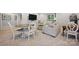 Comfortable living room with soft, neutral color scheme features a round table and a large, plush sofa at 5118 Waldron Meadow Dr, Charlotte, NC 28226