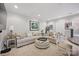 Comfortable living room with neutral colors, plush seating, and abundant natural light at 5118 Waldron Meadow Dr, Charlotte, NC 28226