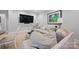 Comfortable living room with soft, neutral color scheme features a round table and a large, plush sofa at 5118 Waldron Meadow Dr, Charlotte, NC 28226