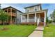 Charming two-story home with inviting front porch and landscaped yard at 517 E Main St, Rock Hill, SC 29730
