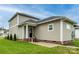 Charming home with light-colored siding, black door and brick foundation, and a well-maintained lawn at 517 E Main St, Rock Hill, SC 29730