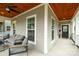Relaxing front porch with comfortable seating and stylish ceiling at 517 E Main St, Rock Hill, SC 29730