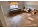Unfinished basement space offering endless possibilities for customization and expansion, awaiting your creative vision at 6561 Weldon Nw Cir, Concord, NC 28027