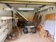 Garage featuring ample space for storage and projects, including a Craftsman lawn tractor at 6561 Weldon Nw Cir, Concord, NC 28027