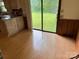 Bright eat-in kitchen area with sliding glass doors to backyard, providing natural light and seamless indoor-outdoor living at 6561 Weldon Nw Cir, Concord, NC 28027