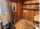 Practical utility room featuring essential appliances, storage shelves, and durable flooring, ready for immediate use at 6561 Weldon Nw Cir, Concord, NC 28027
