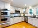 Well-appointed kitchen with stainless steel appliances, granite countertops, and ample storage at 6941 Queensberry Dr, Charlotte, NC 28226