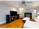 Bright living room showcasing hardwood floors, fireplace, and modern furnishings at 6941 Queensberry Dr, Charlotte, NC 28226