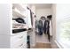Organized walk-in closet featuring built-in shelving, hanging rods, and a window for natural light at 7024 Jane Parks Way, Charlotte, NC 28217