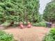 Backyard featuring a brick patio with seating and grill, perfect for outdoor relaxation and entertainment at 705 Woburn Abbey Dr, Fort Mill, SC 29715