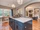 Bright kitchen features an island cooktop and a seamless open floor plan perfect for entertaining at 705 Woburn Abbey Dr, Fort Mill, SC 29715
