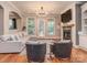 Cozy living room features fireplace, built-ins, hardwood floors, and neutral decor and furnishings at 705 Woburn Abbey Dr, Fort Mill, SC 29715