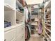 This walk-in closet offers custom shelving, ample storage, and modern design at 705 Woburn Abbey Dr, Fort Mill, SC 29715