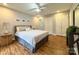 Comfortable bedroom with hardwood floors, great natural light, and closet space at 7133 Tall Tree Ln, Charlotte, NC 28214