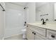 Bathroom featuring a tub/shower combo and a vanity with matte black hardware at 720 Reigate Rd, Charlotte, NC 28262