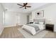 Bedroom featuring a ceiling fan, a window, and carpeted floors at 720 Reigate Rd, Charlotte, NC 28262