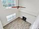 Living room with high ceilings, lots of natural light, and a fireplace at 720 Reigate Rd, Charlotte, NC 28262