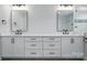 Modern bathroom featuring double vanities, sleek fixtures, and a seamless design at 7322 Vesper Dr, Huntersville, NC 28078