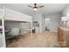 Bright bedroom features a bunk bed, desk area, neutral walls, and an ensuite bathroom at 7322 Vesper Dr, Huntersville, NC 28078