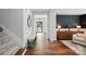 Inviting foyer with hardwood floors, wainscoting, and stylish decor at 7322 Vesper Dr, Huntersville, NC 28078